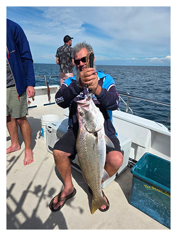 Fisherman with Mullaway